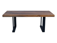 Embrace the Rugged Beauty: A Bog Oak coffee table, front view. Revel in the table's raw and rugged charm, showcasing the natural textures of Bog Oak wood.