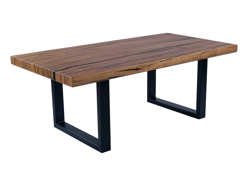 Enjoy the Rustic Charm: A Bog Oak coffee table, side view. Revel in the table's sturdy construction and the rustic details that exude timeless charm.