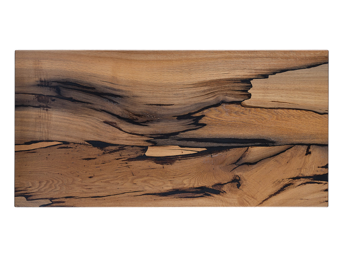 Bog Oak coffee table, top view. Uncovering the natural textures and polished details that exemplify rustic refinement.