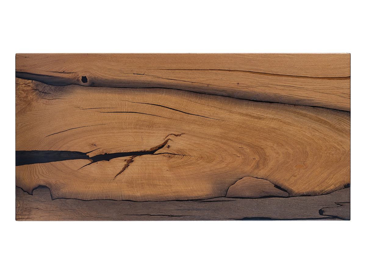 Ageless Charm: A handcrafted Bog Oak coffee table, top view. Uncover the intricate detailing and the ageless allure of the Bog Oak wood.