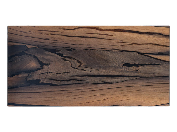 Ancient Beauty: A coffee table made from centuries-old Bog Oak, top view. Uncover the intriguing wood grain and the aged charm etched into the ancient Bog Oak.