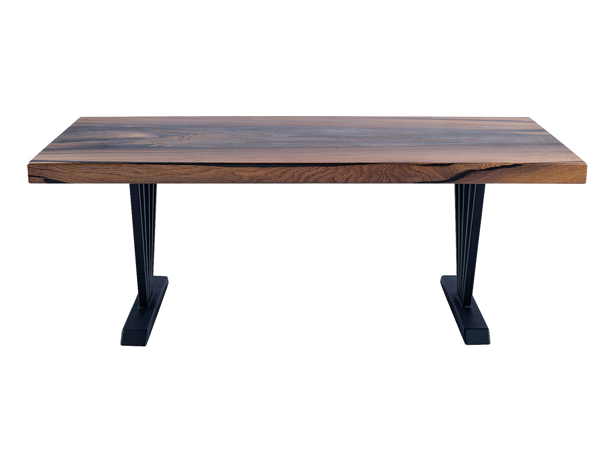 Ancient Beauty: A coffee table made from centuries-old Bog Oak, front view. Experience the timeless allure of this remarkable table crafted from ancient wood.