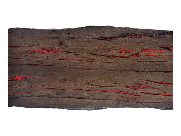 The Red Symphony: A Unique Bog Oak coffee table, top view. Revealing the stunning red patterns and the careful arrangement of the Bog Oak wood, presenting a captivating visual symphony. Natural edges.